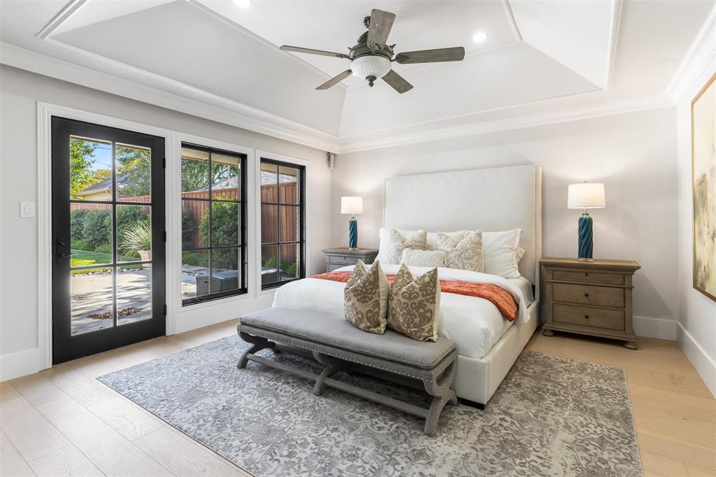 3922 Inwood Road Dallas, TX 75209 - Photo 14 of 35 a bedroom with a bed and large window