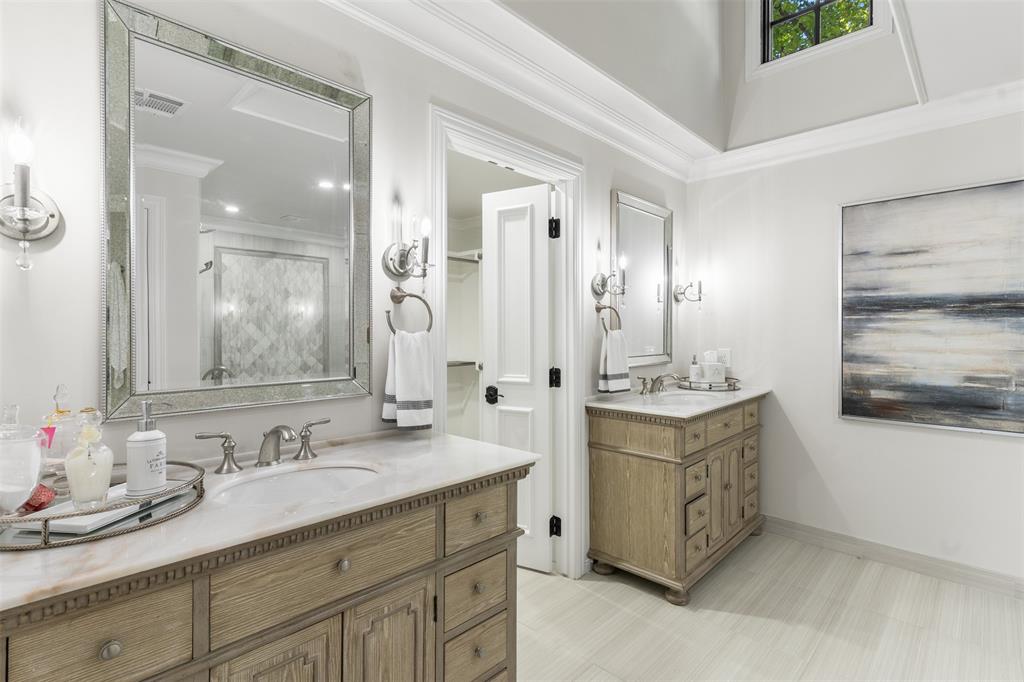 3922 Inwood Road Dallas, TX 75209 - Photo 16 of 35 a bathroom with a granite countertop double vanity sink mirror and double