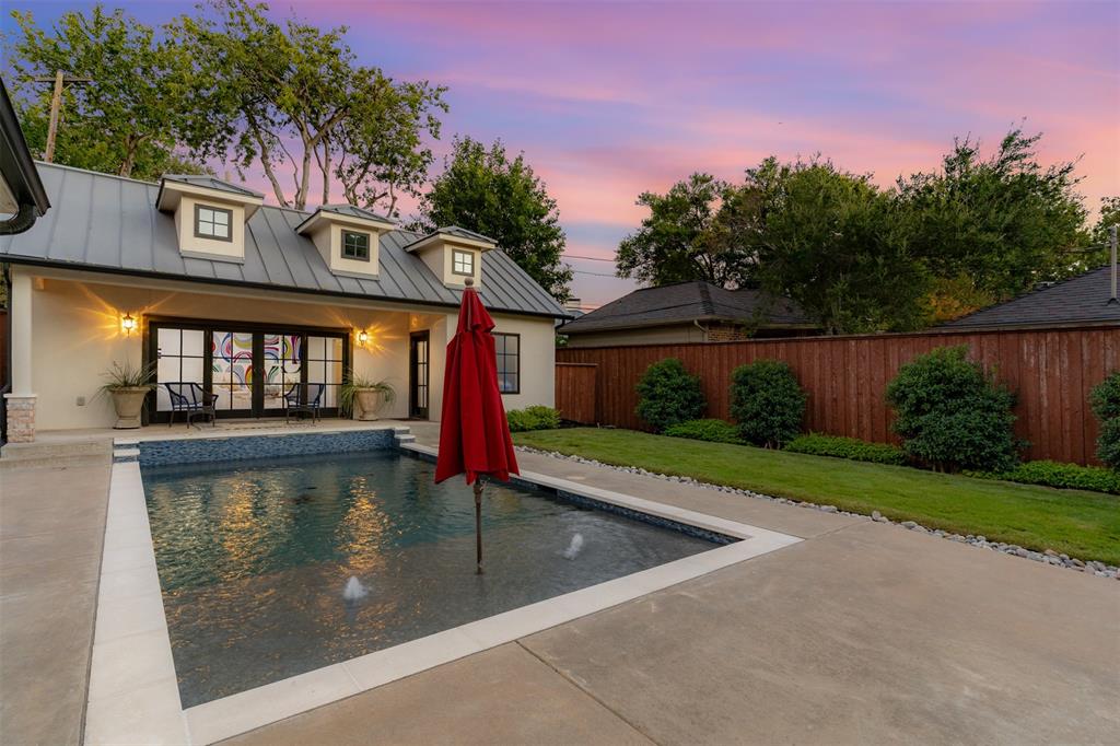 3922 Inwood Road Dallas, TX 75209 - Photo 23 of 35 a view of a swimming pool with a patio
