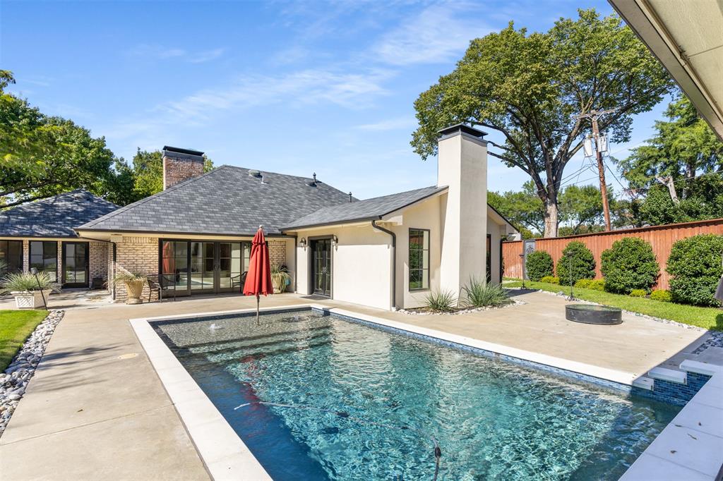 3922 Inwood Road Dallas, TX 75209 - Photo 26 of 35 front view of a house with a yard