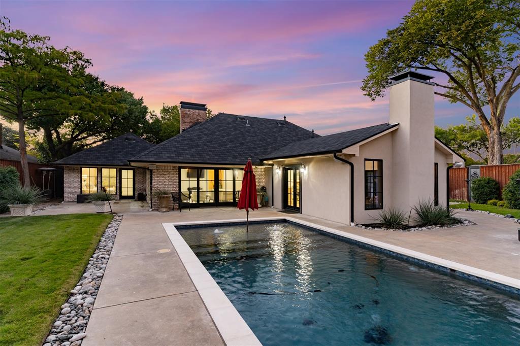 3922 Inwood Road Dallas, TX 75209 - Photo 27 of 35 a front view of a house with a yard
