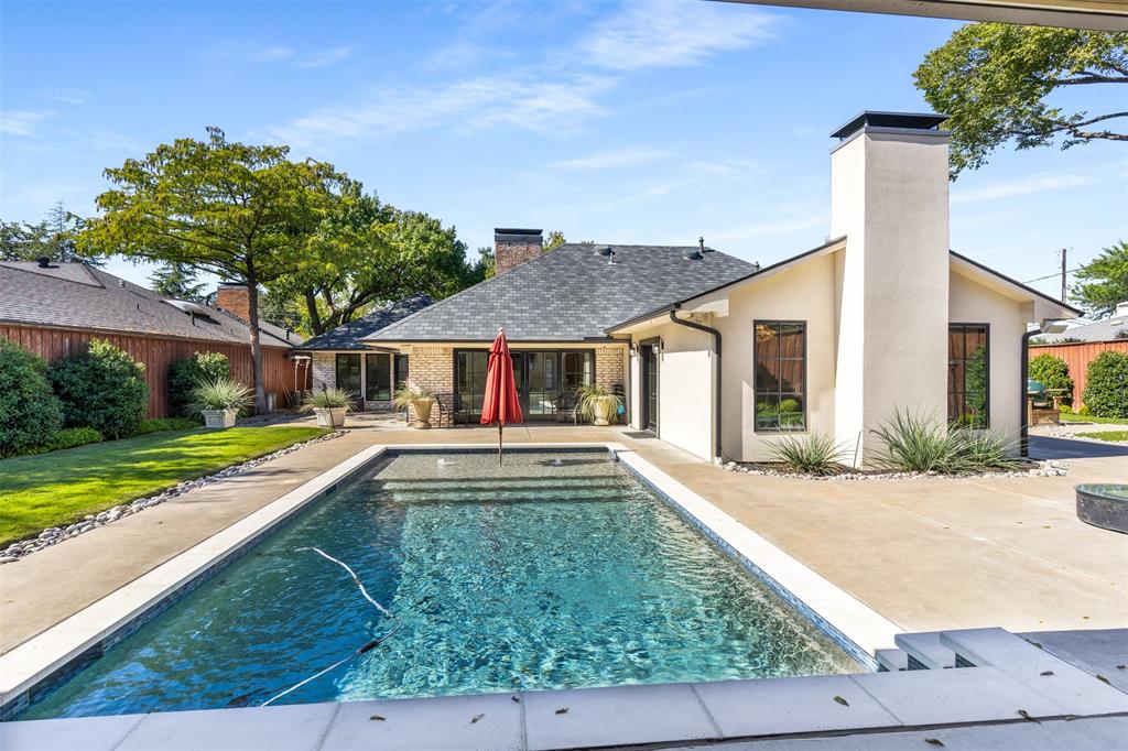 3922 Inwood Road Dallas, TX 75209 - Photo 28 of 35 a front view of house with yard and green space