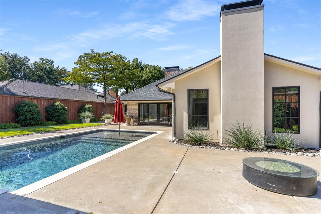 3922 Inwood Road Dallas, TX 75209 - Photo 29 of 35 a front view of house with yard and outdoor seating