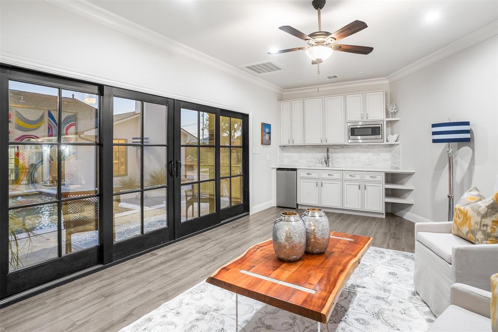 3922 Inwood Road Dallas, TX 75209 - Photo 31 of 35 a living room with furniture and a table