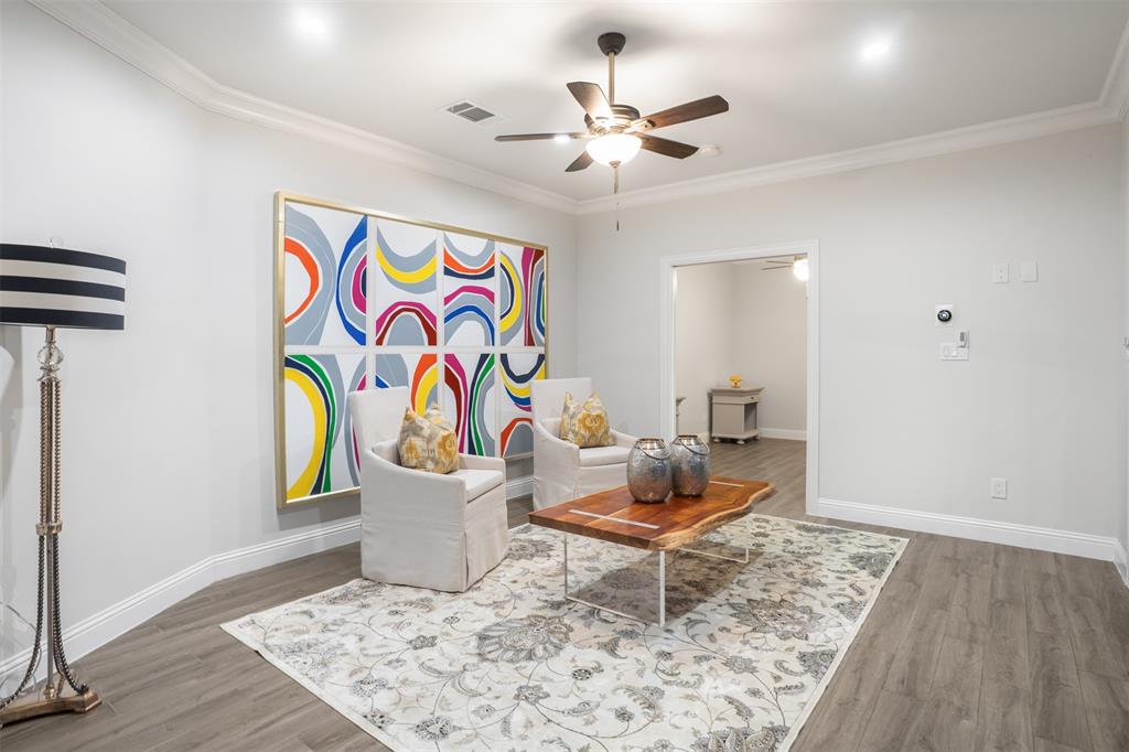3922 Inwood Road Dallas, TX 75209 - Photo 32 of 35 a living room with a rug and a rug