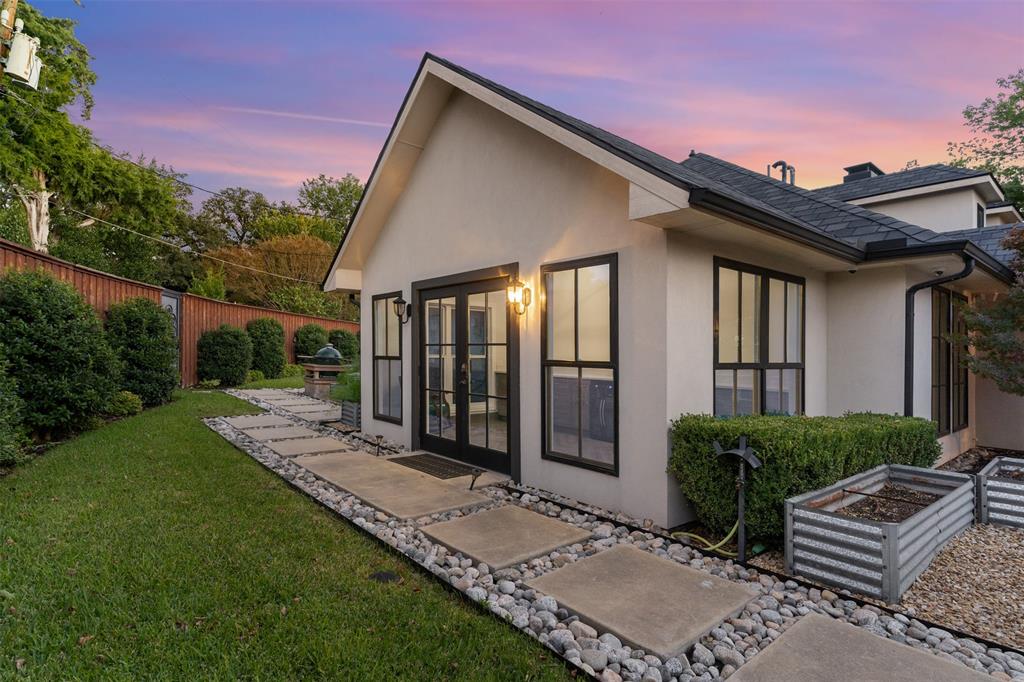 3922 Inwood Road Dallas, TX 75209 - Photo 34 of 35 a view of house with backyard and garden