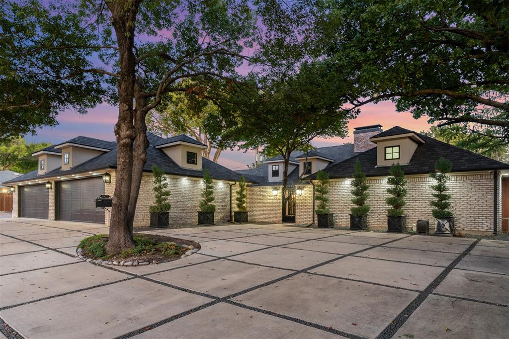 3922 Inwood Road Dallas, TX 75209 - Photo 5 of 35 a front view of a building with garden