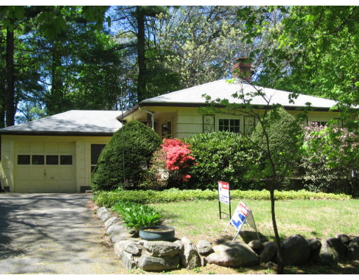 53 Pierrepont Road Newton, MA 02462 - Photo 1 of 13 a front view of a house with a yard