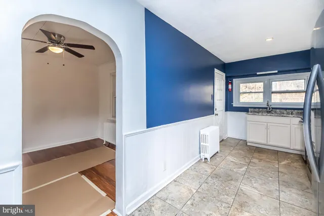 a bathroom with a bathtub and a sink