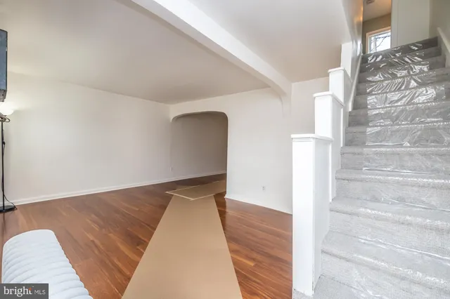 a view of wooden floor in an empty room