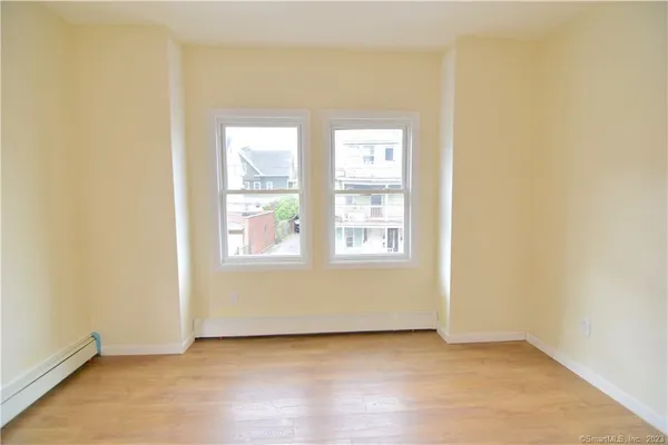 an empty room with window