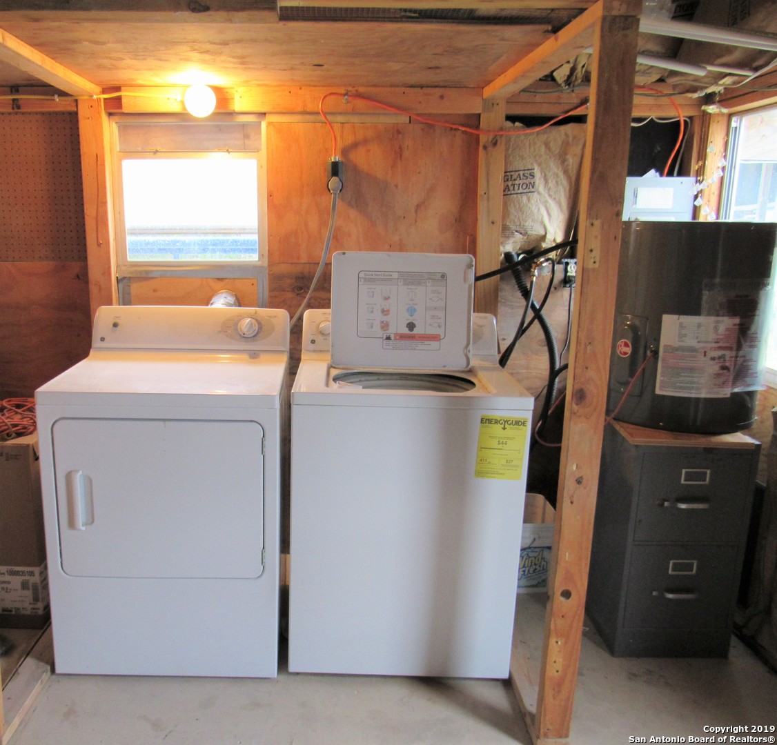 100 Timber Road, Unit 3 Pipe Creek, TX 78063 - Photo 11 of 11 a utility room with dryer and washer