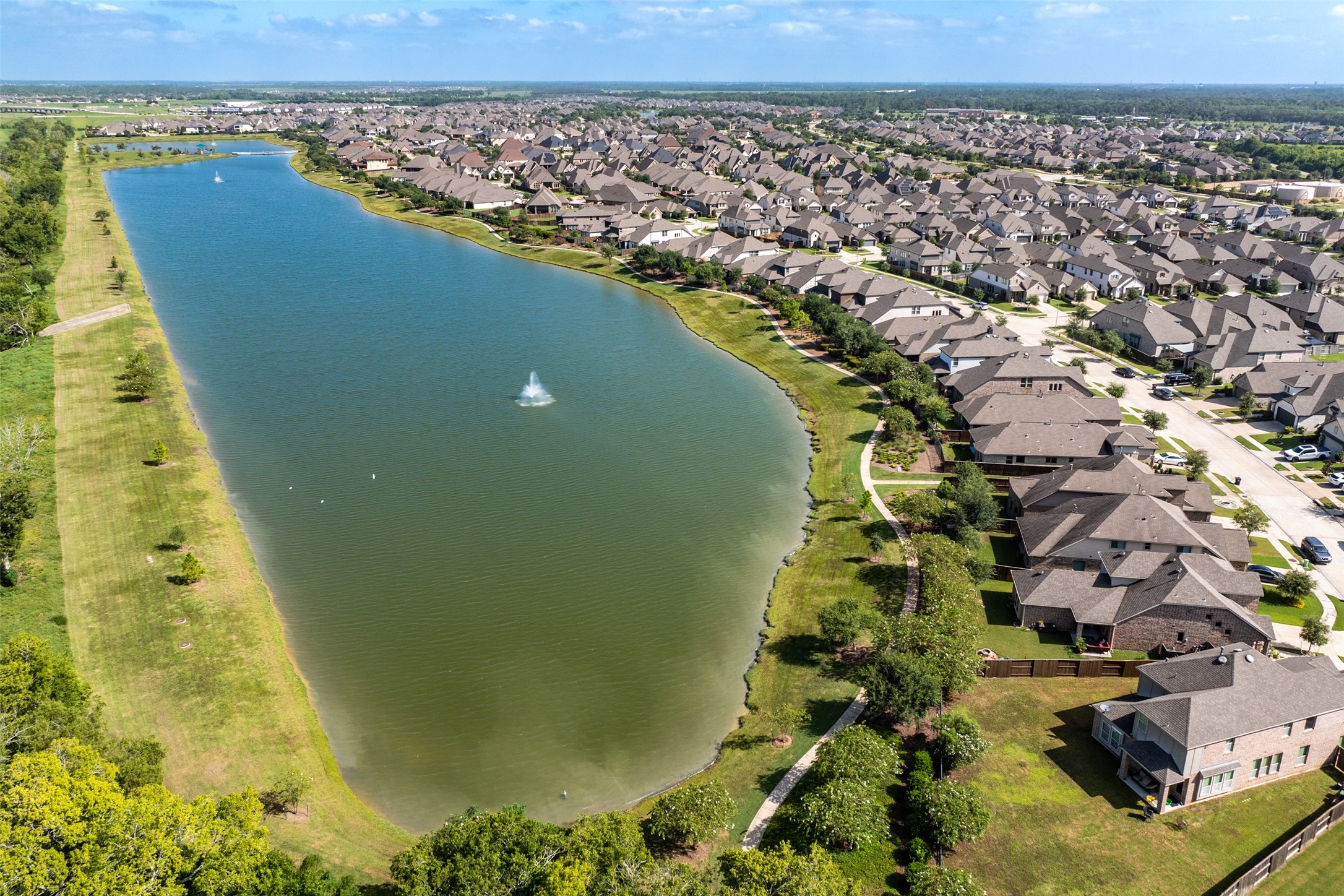 4946 Hitchings Court Rosharon, TX 77583 - Photo 43 of 49 Meridiana stocked lake for fishing