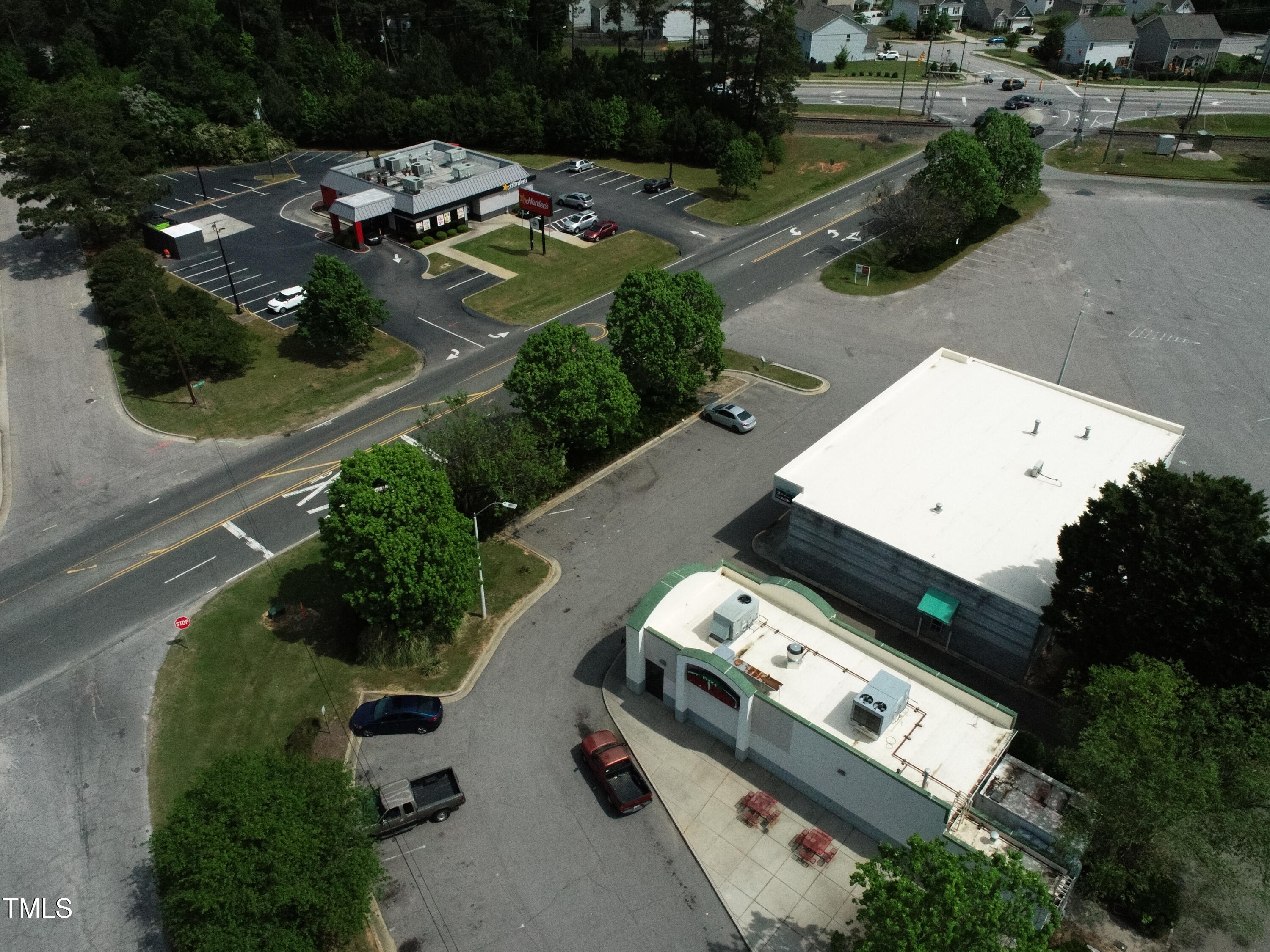200 Vandora Springs Road Garner, NC 27529 - Photo 12 of 37 an aerial view of a house with a yard