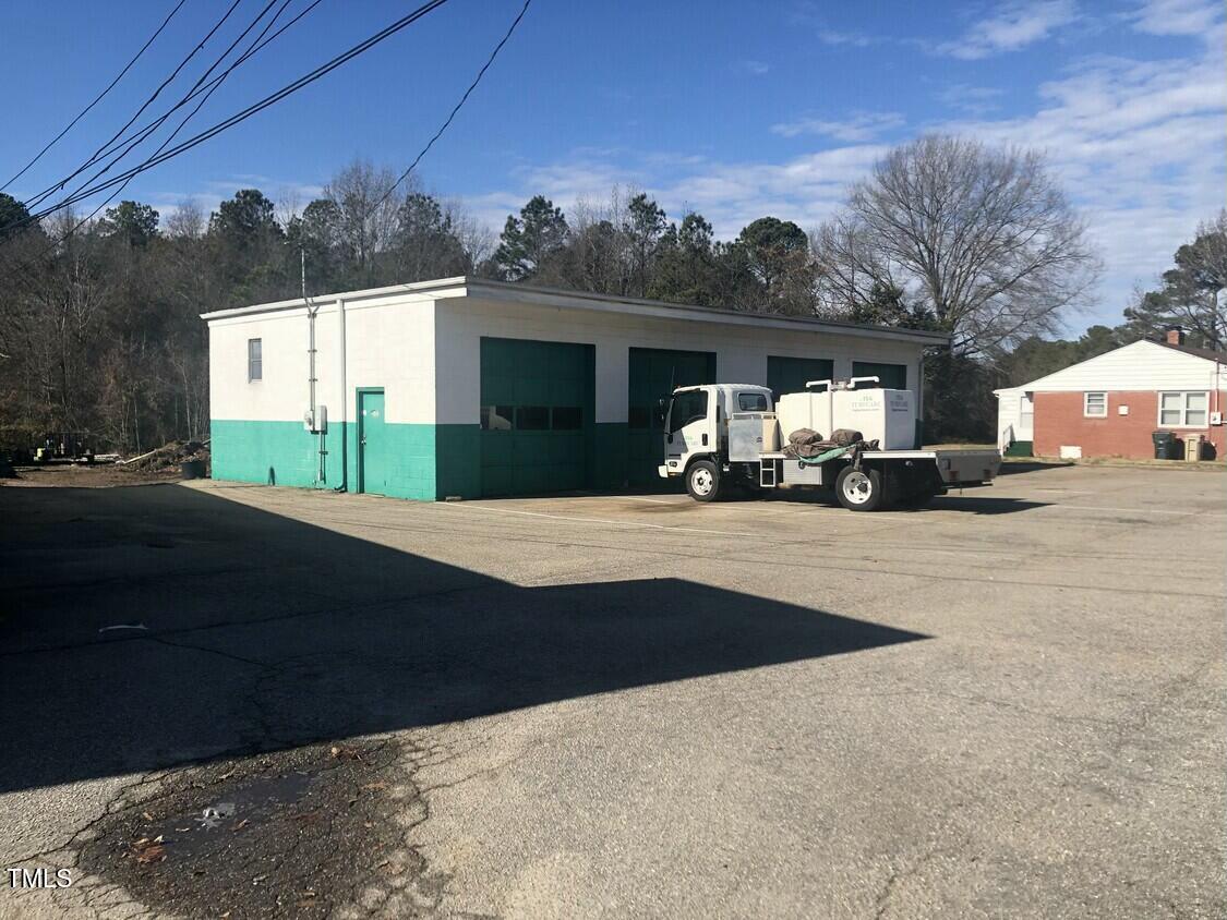 200 Vandora Springs Road Garner, NC 27529 - Photo 17 of 37 a view of a car park in front of a house