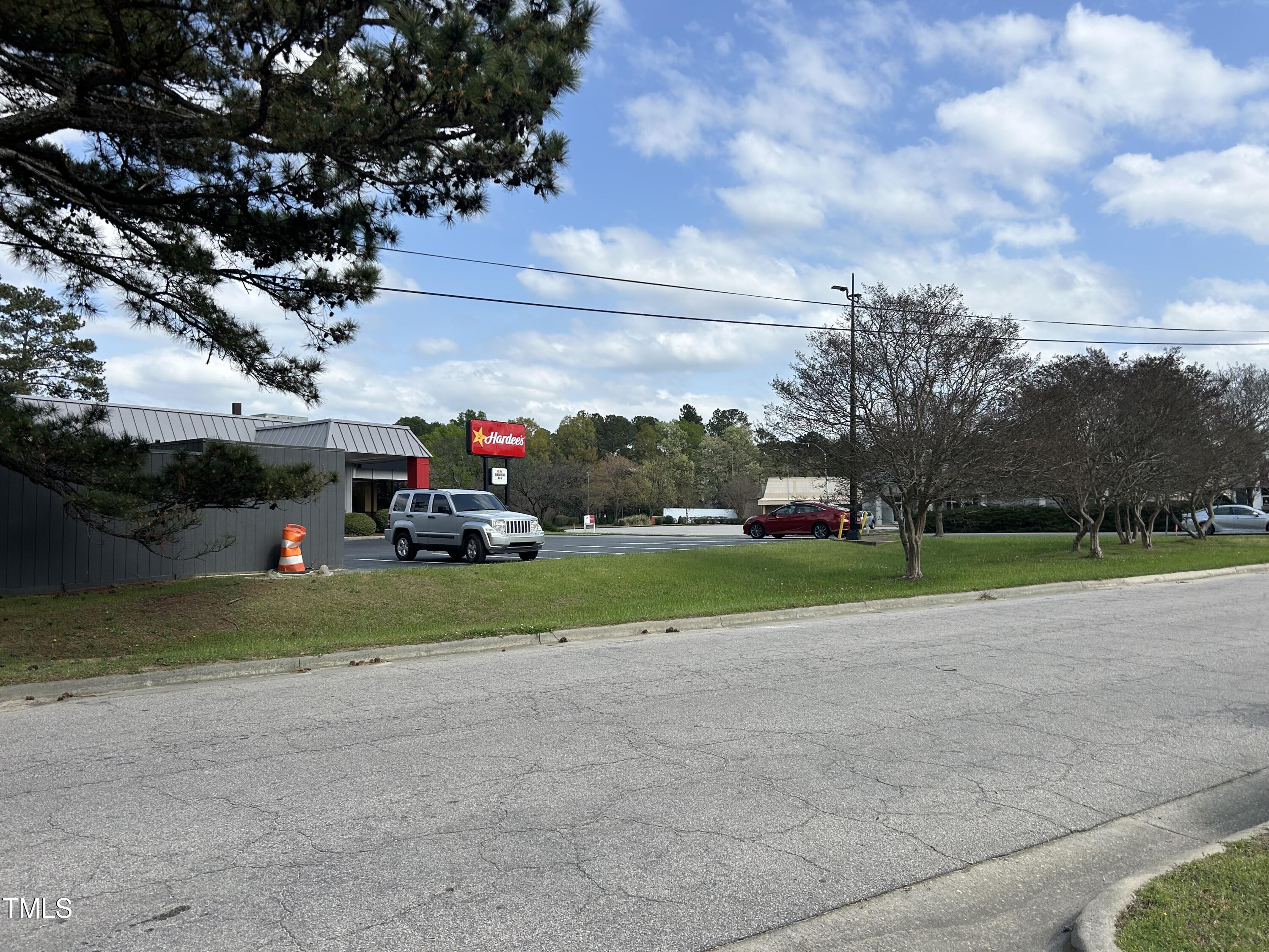 200 Vandora Springs Road Garner, NC 27529 - Photo 23 of 37 a view of street and electric pole on its side