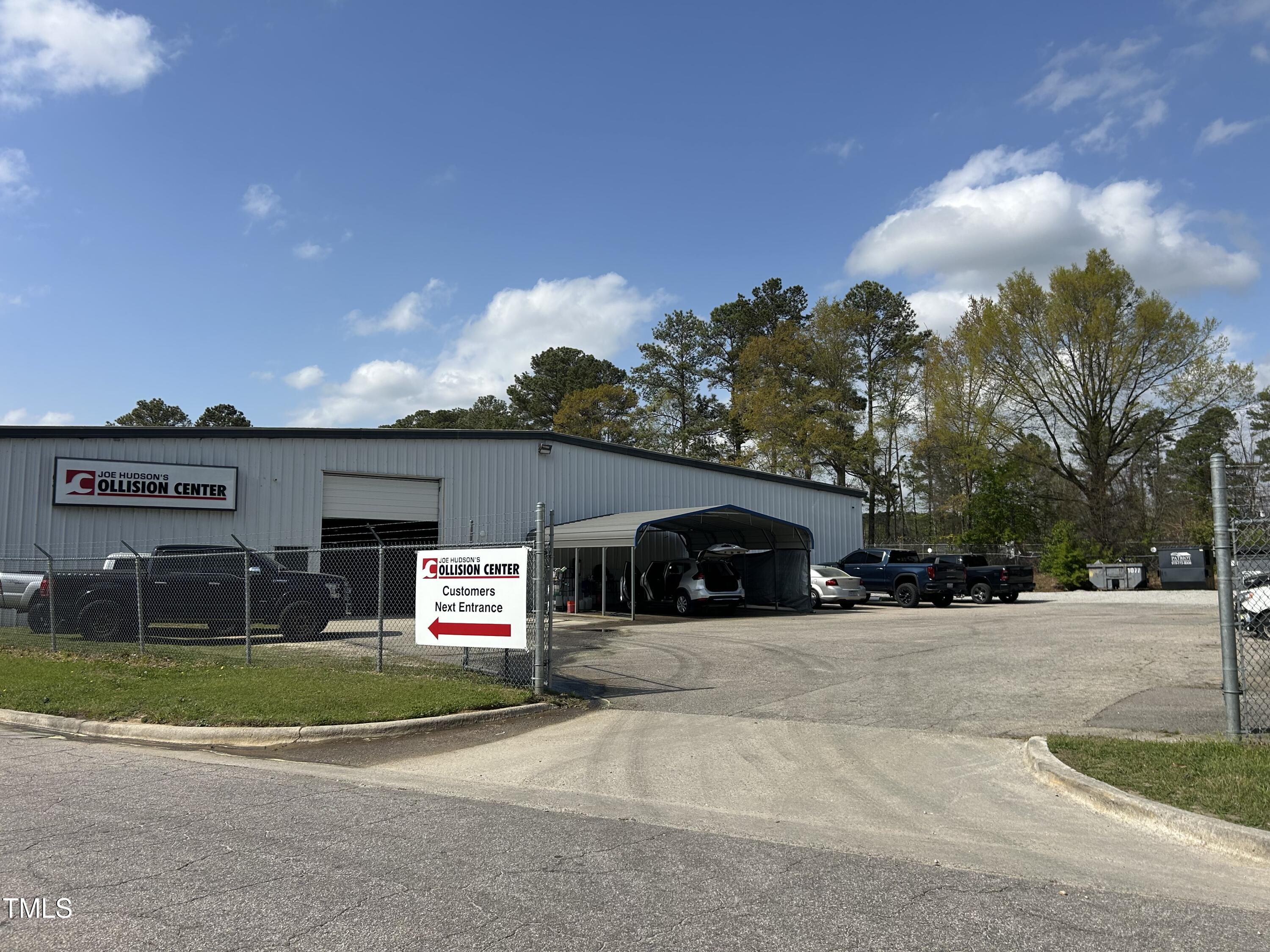 200 Vandora Springs Road Garner, NC 27529 - Photo 26 of 37 a view of a house with a yard