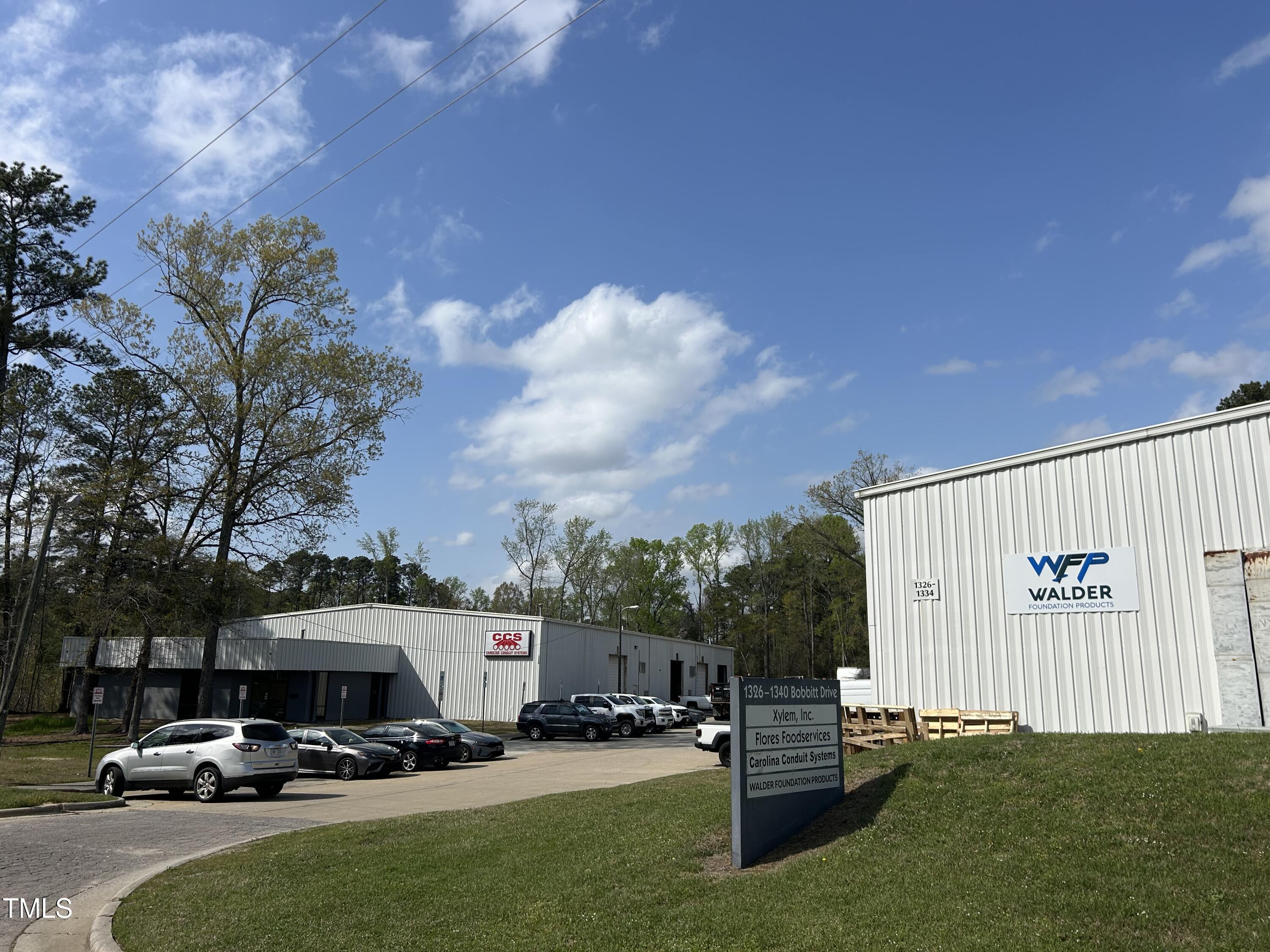 200 Vandora Springs Road Garner, NC 27529 - Photo 27 of 37 a car parked in front of a house