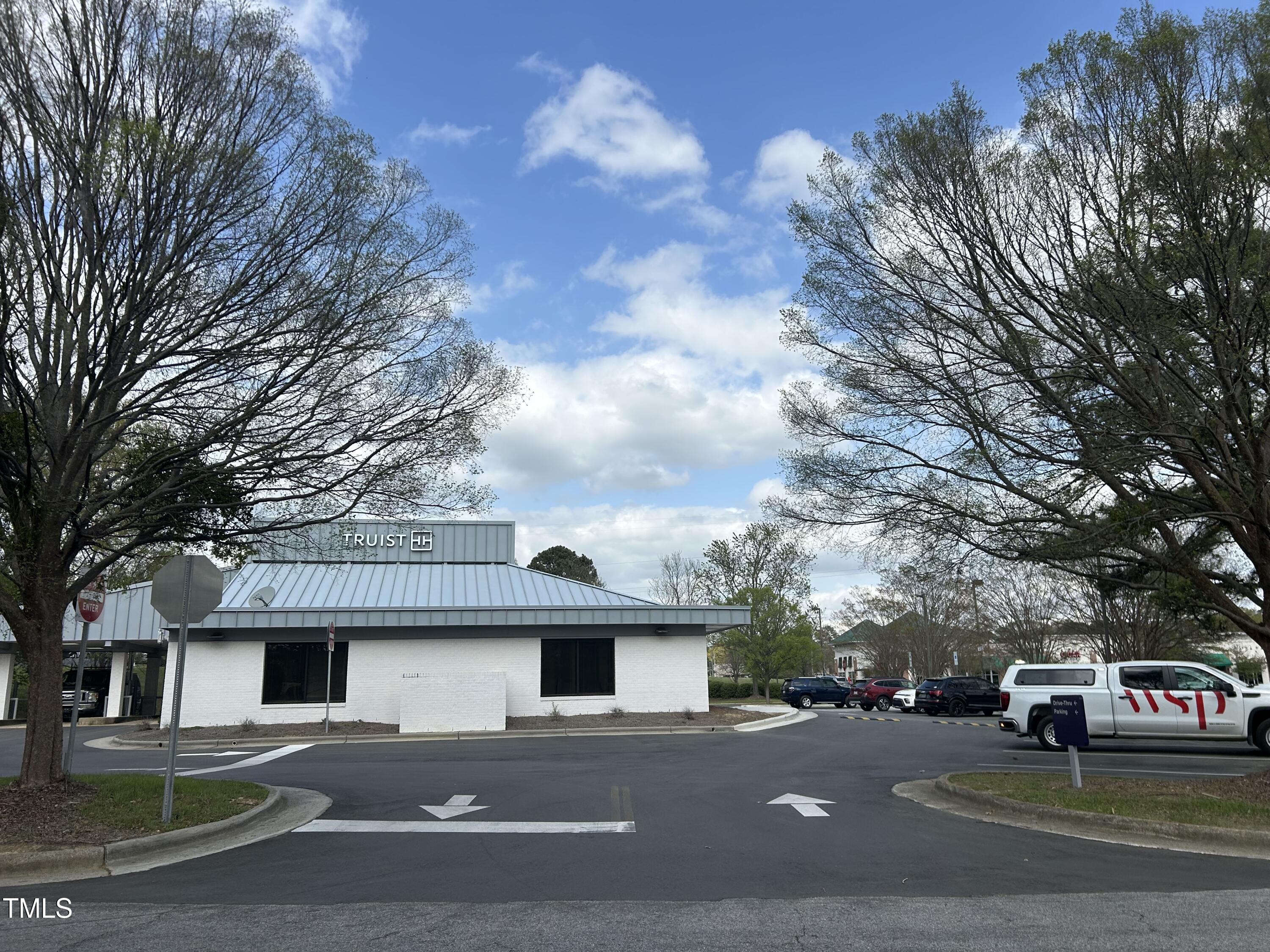 200 Vandora Springs Road Garner, NC 27529 - Photo 30 of 37 a front view of a house with a yard and garage