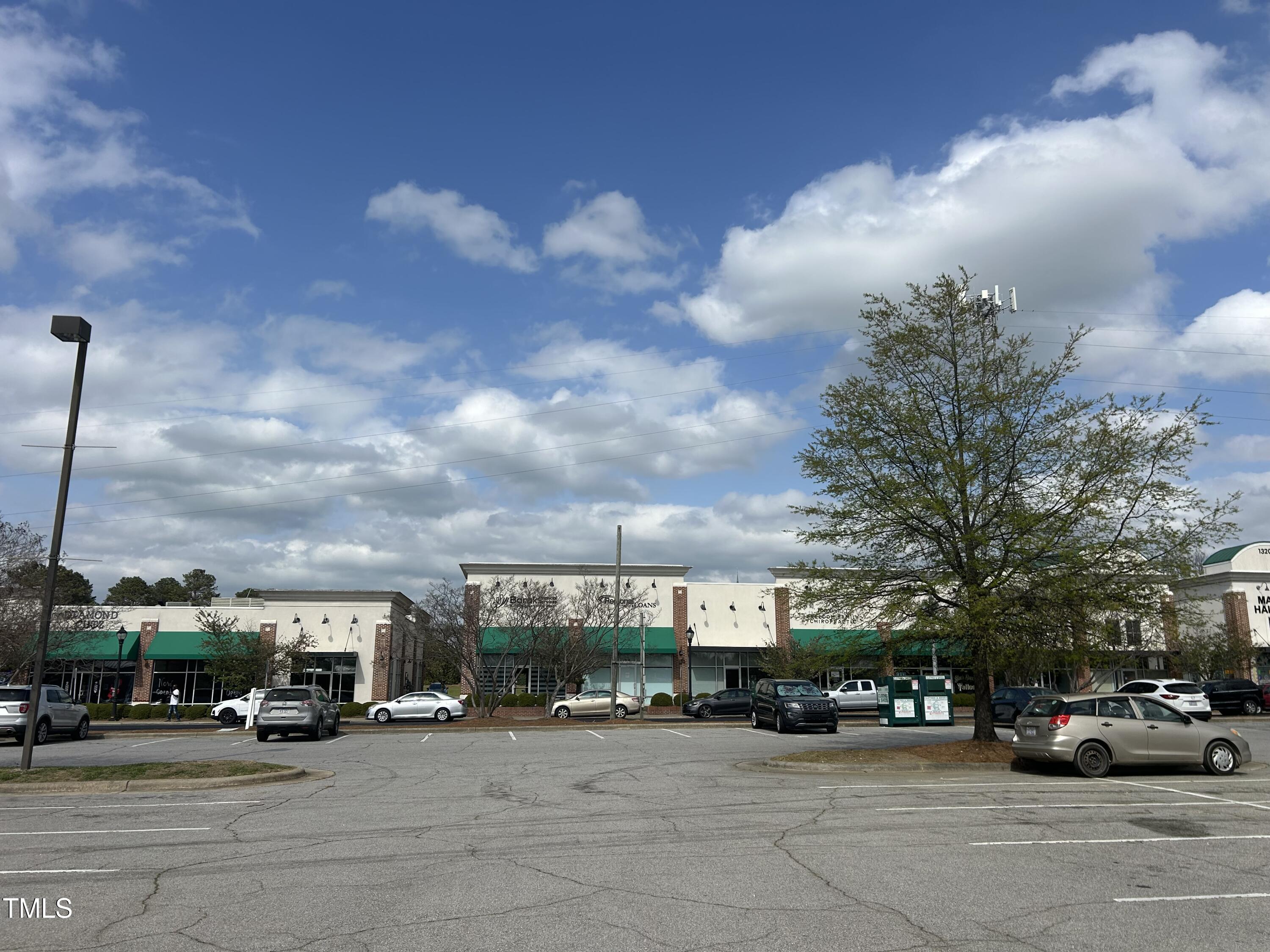 200 Vandora Springs Road Garner, NC 27529 - Photo 33 of 37 a view of a cars parked in front of a building