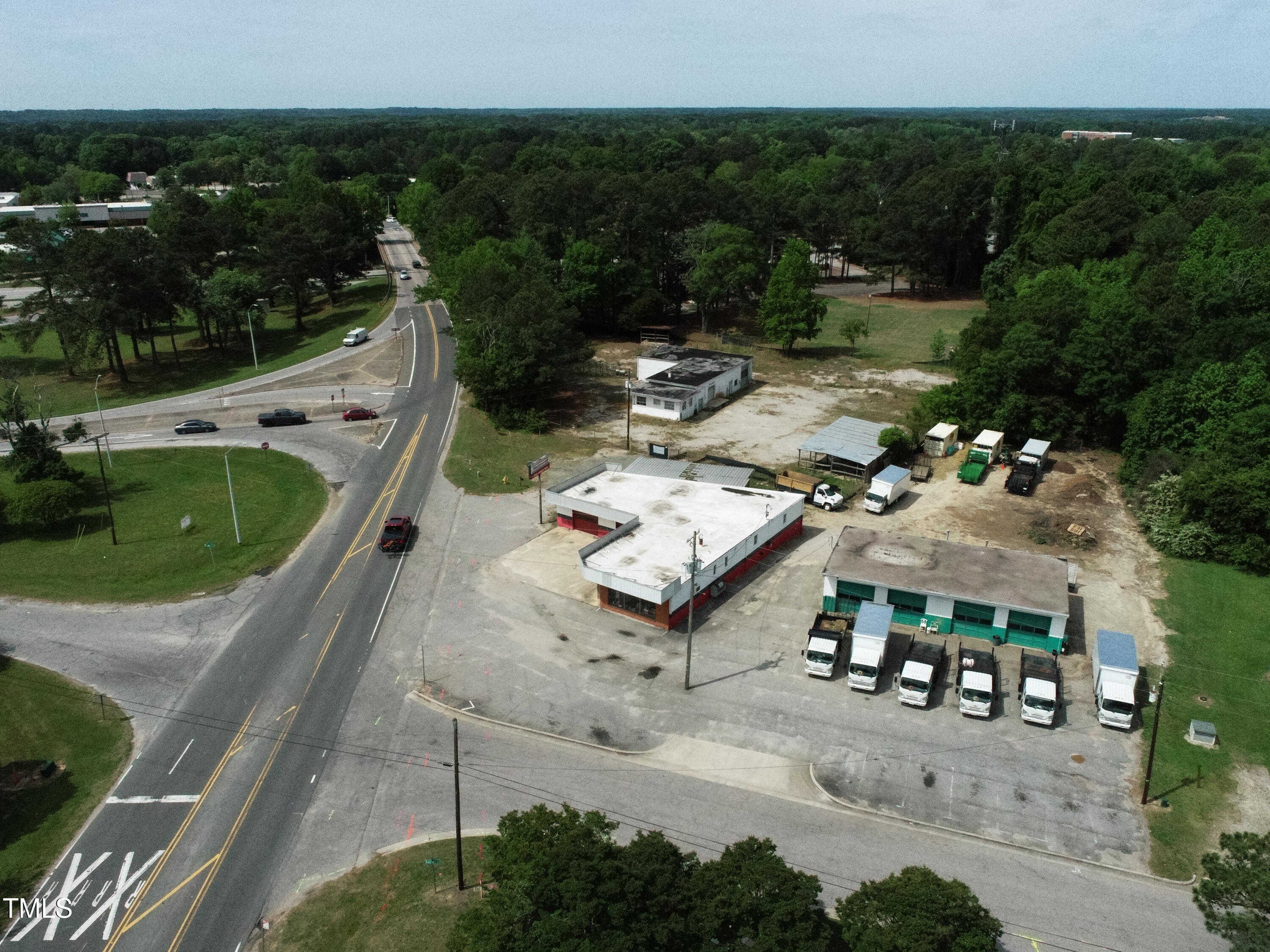 200 Vandora Springs Road Garner, NC 27529 - Photo 5 of 37 an aerial view of a house with outdoor space
