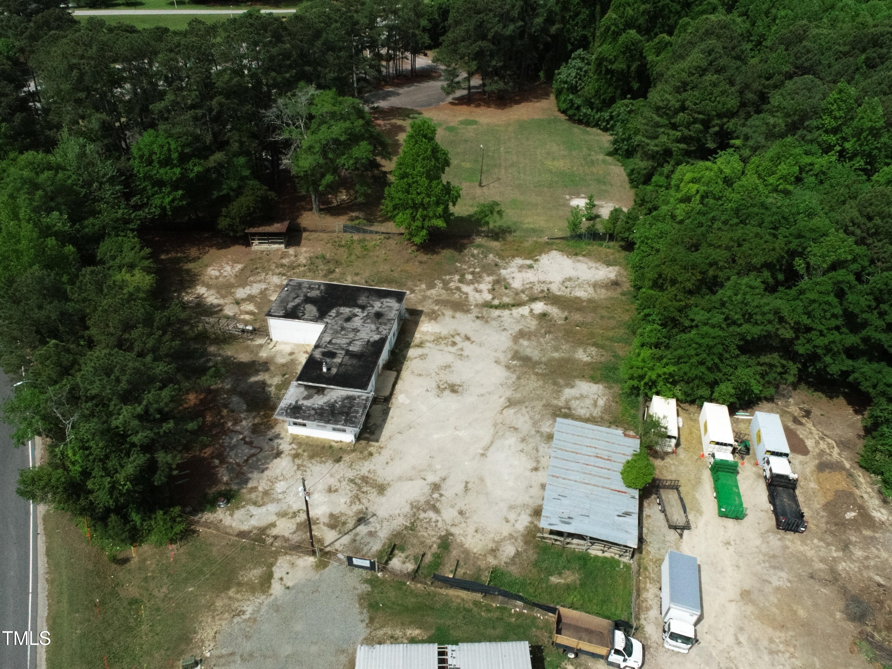 200 Vandora Springs Road Garner, NC 27529 - Photo 8 of 37 an aerial view of a house with a yard