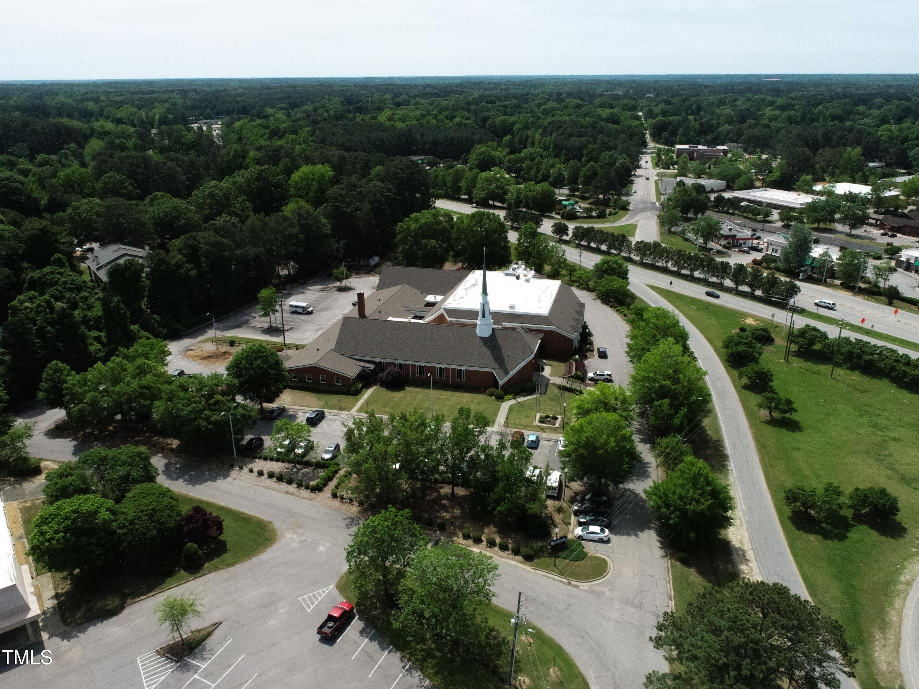 200 Vandora Springs Road Garner, NC 27529 - Photo 10 of 37 an aerial view of a house with lots of trees