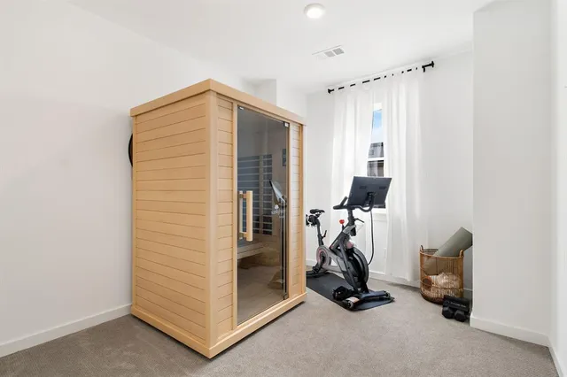 a view of a room with gym equipment