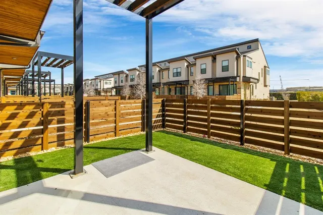 a view of a house with a yard and stairs