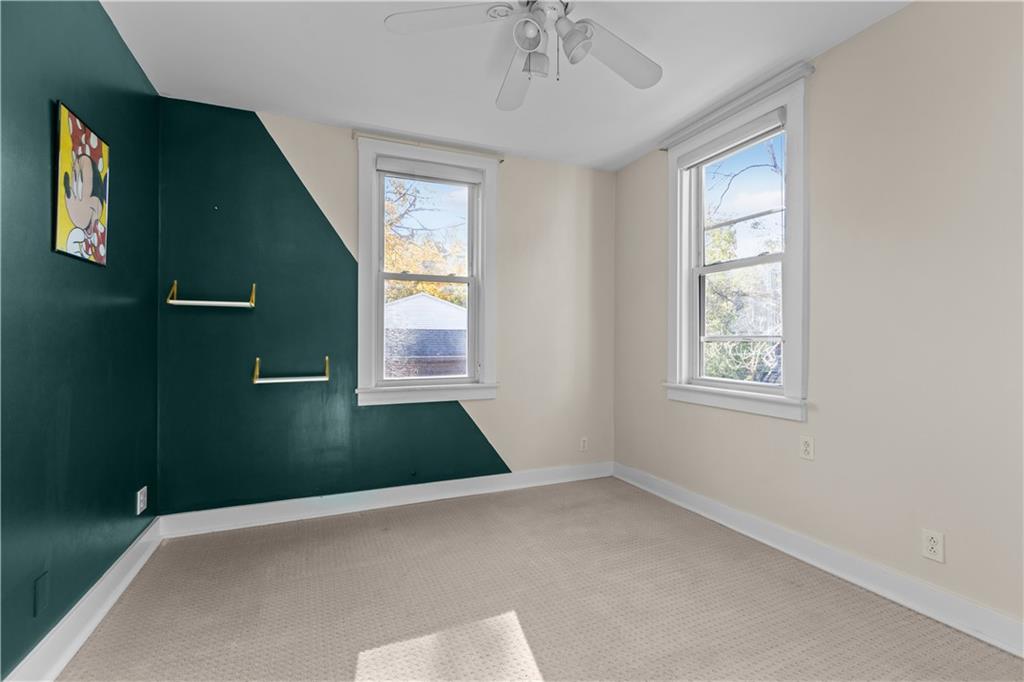 6314 Forward Avenue Pittsburgh, PA 15217 - Photo 18 of 27 a view of an empty room with a window