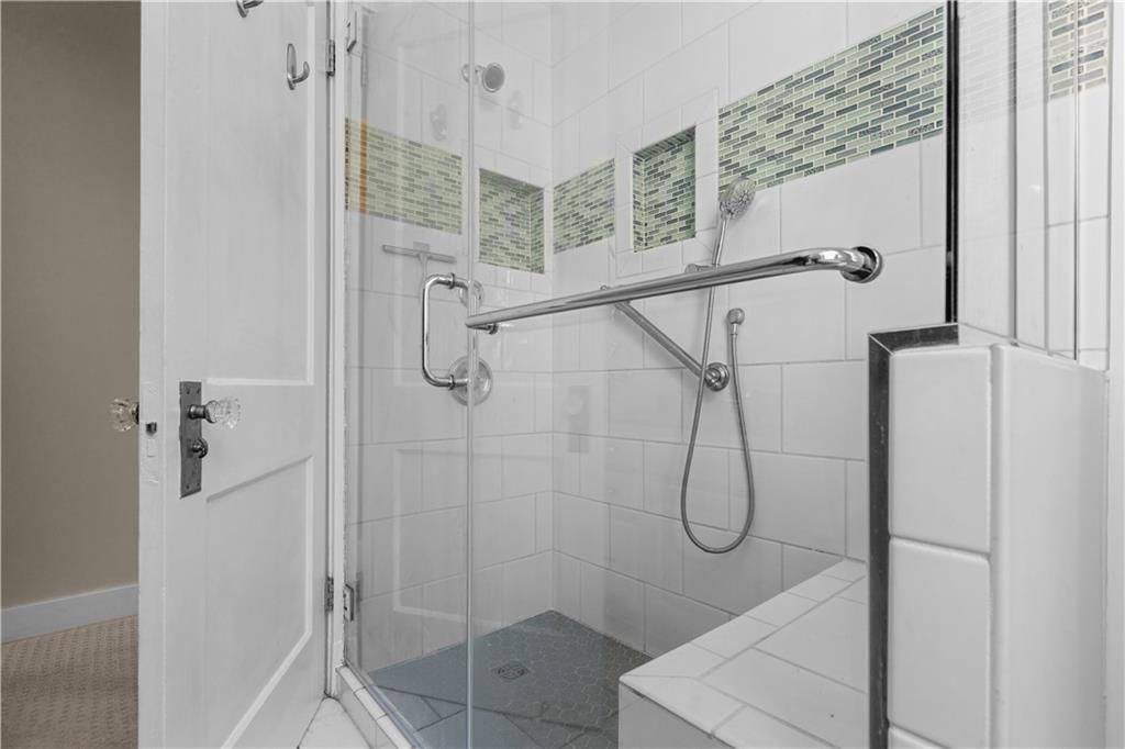 6314 Forward Avenue Pittsburgh, PA 15217 - Photo 21 of 27 a bathroom with a glass shower door