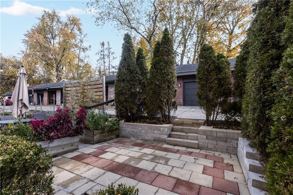 6314 Forward Avenue Pittsburgh, PA 15217 - Photo 24 of 27 a front view of a house with garden