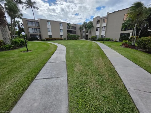 a view of a back yard of the house