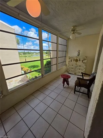 a living room with a couch and a table