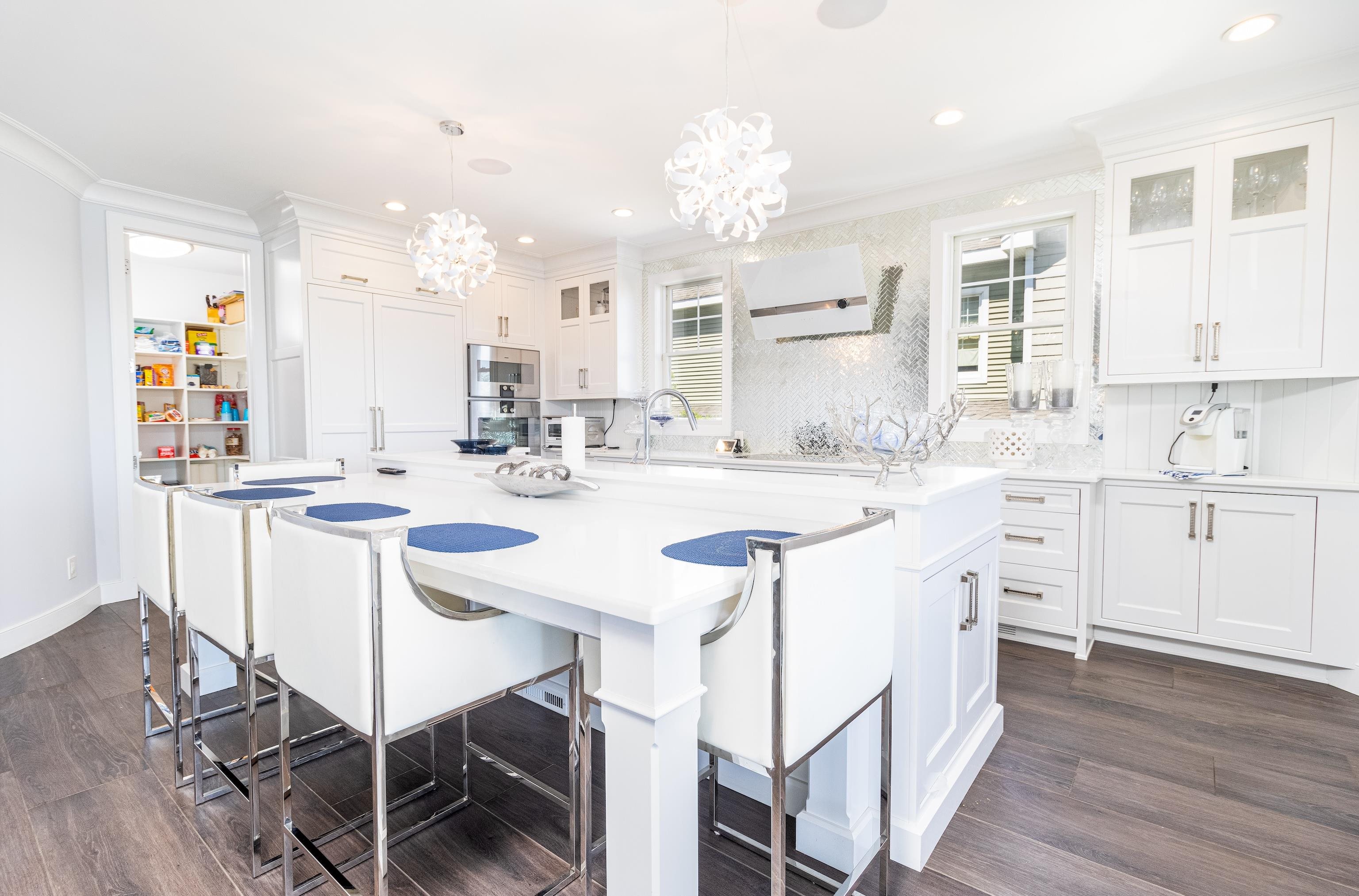 415 20th Avalon, NJ 08202 - Photo 16 of 50 a kitchen with a sink and cabinets