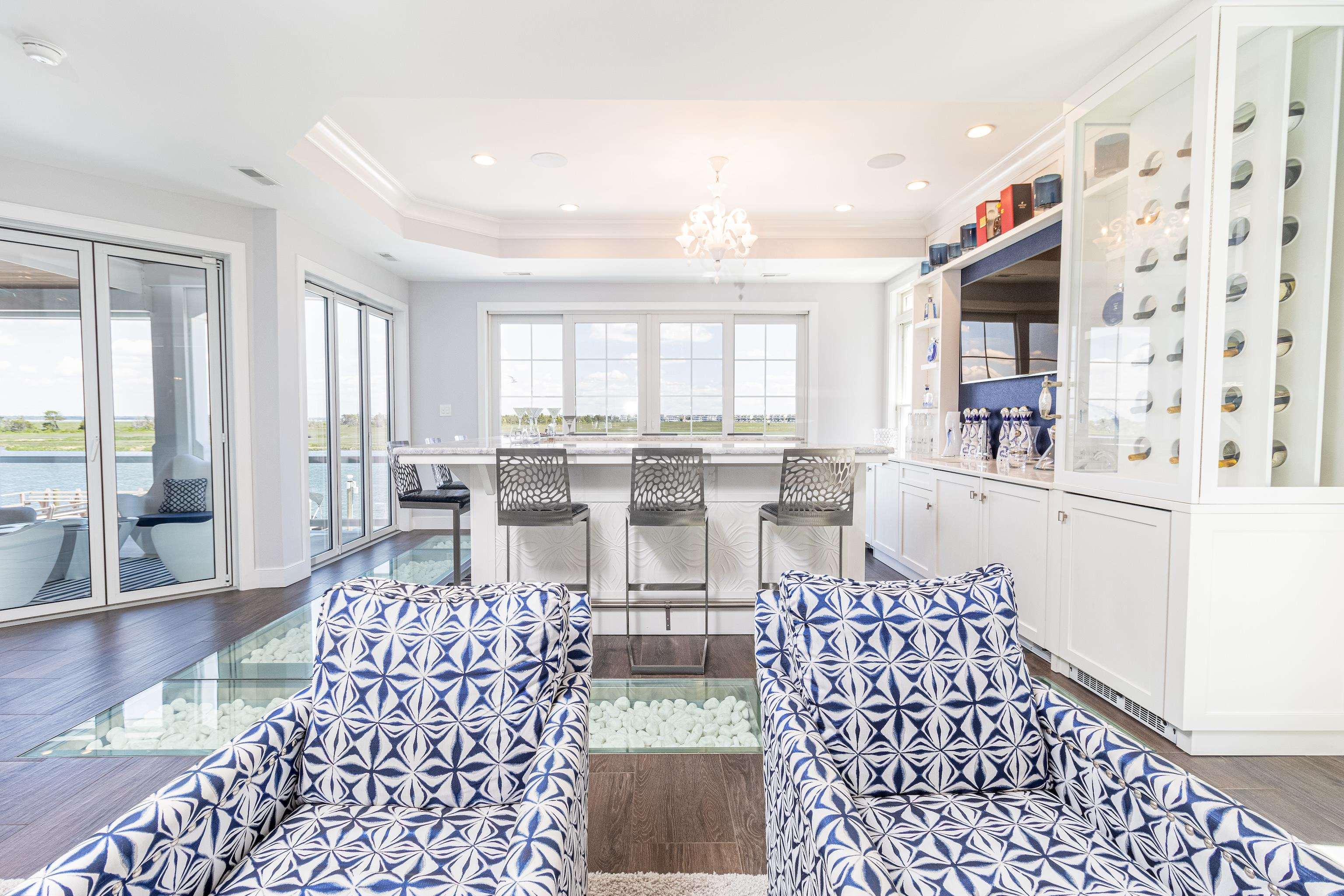 415 20th Avalon, NJ 08202 - Photo 21 of 50 a living room with furniture and a table