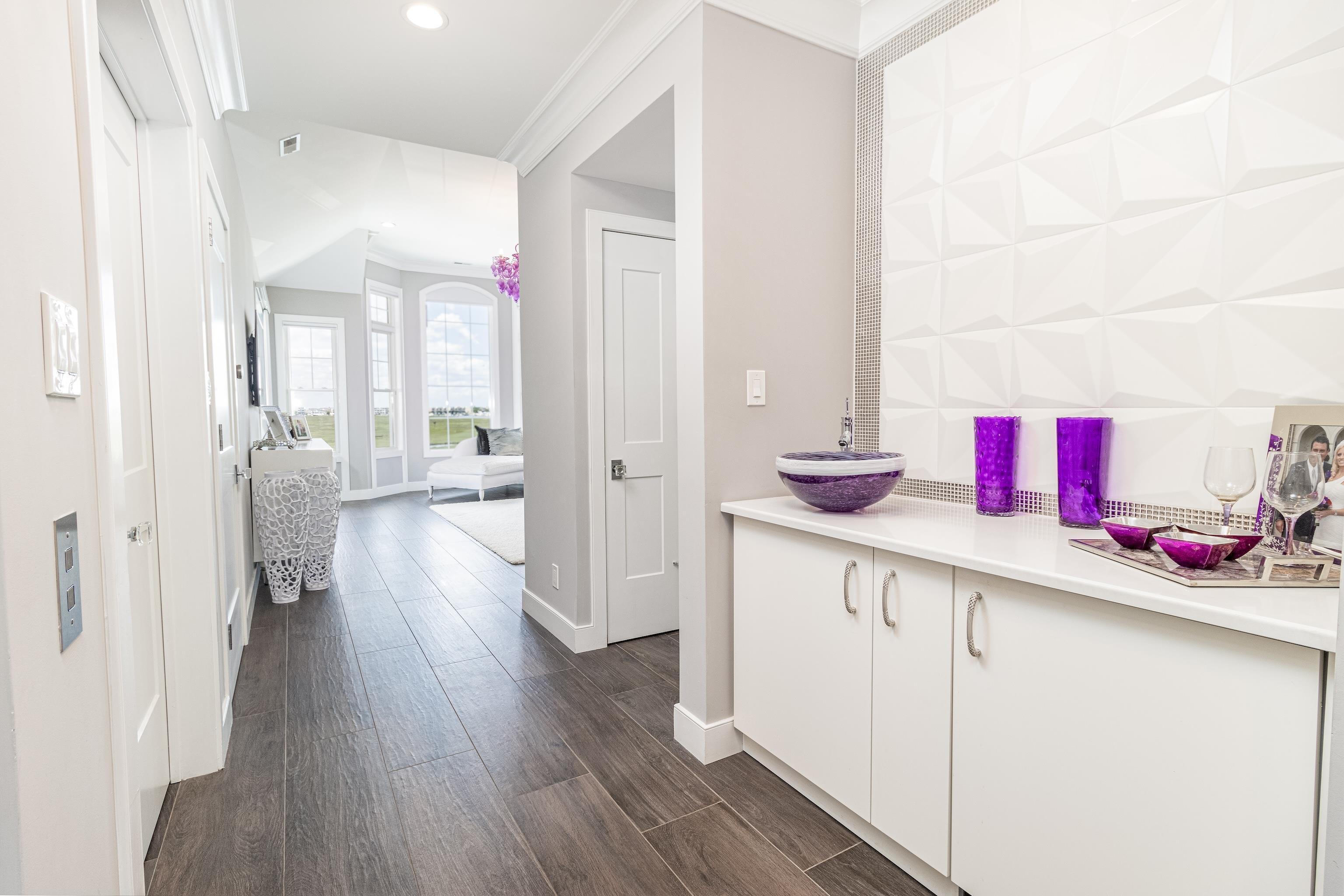 415 20th Avalon, NJ 08202 - Photo 38 of 50 a kitchen with a sink and wooden floor