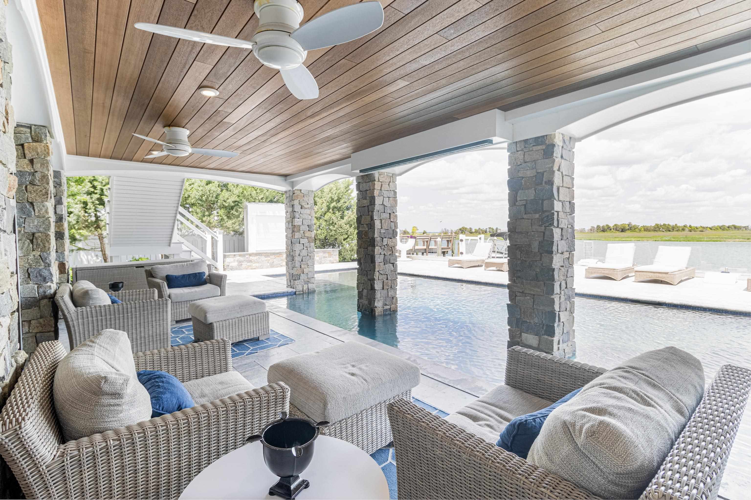 415 20th Avalon, NJ 08202 - Photo 42 of 50 a living room with furniture and a large window