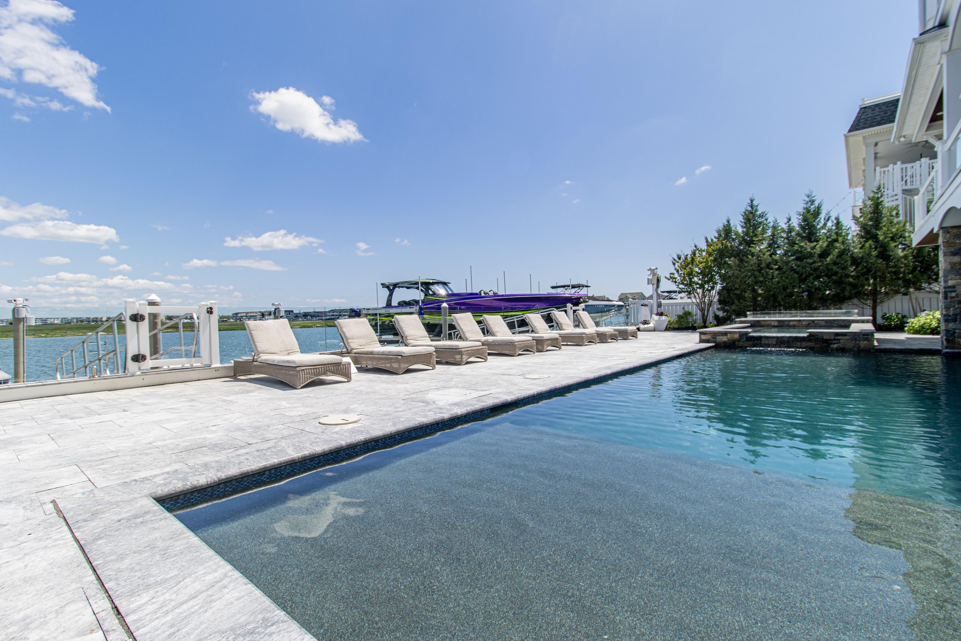 415 20th Avalon, NJ 08202 - Photo 48 of 50 a view of a swimming pool and outdoor space