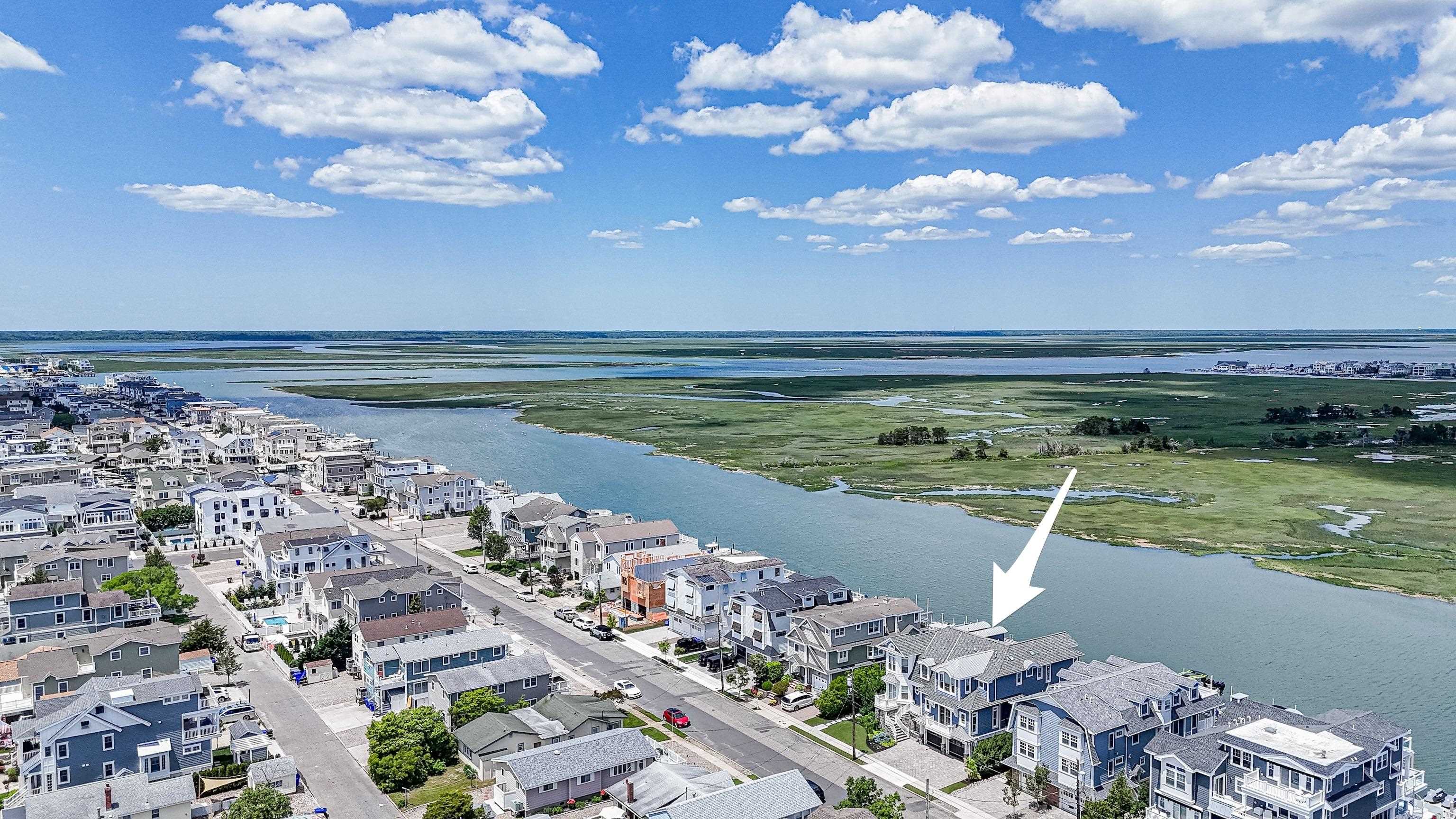 415 20th Avalon, NJ 08202 - Photo 5 of 50 a view of a city with lots of residential buildings ocean and mountain view in back