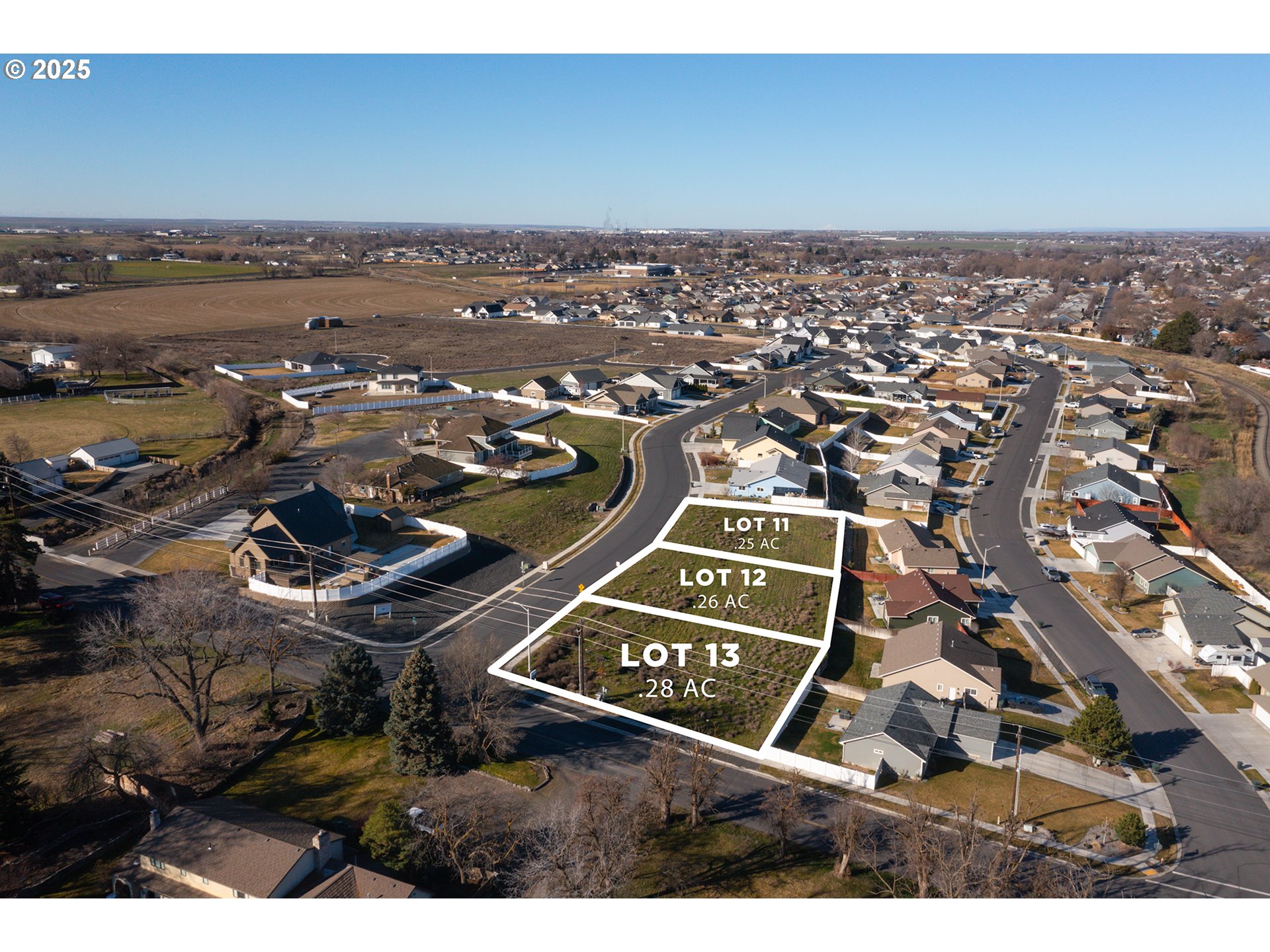 102 Southwest Desert Sky Drive, Unit 13 Hermiston, OR 97838 - Photo 3 of 7 an aerial view of multiple house