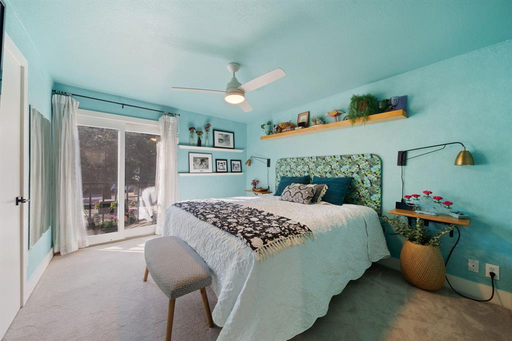 7496 East Northwest Highway, Unit 145 Dallas, TX 75231 - Photo 18 of 35 a bedroom with a bed and a window