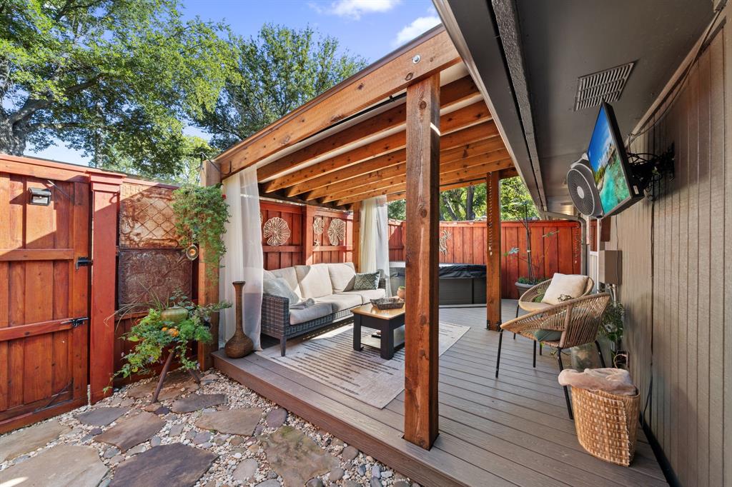 7496 East Northwest Highway, Unit 145 Dallas, TX 75231 - Photo 32 of 35 a view of outdoor space yard deck and patio