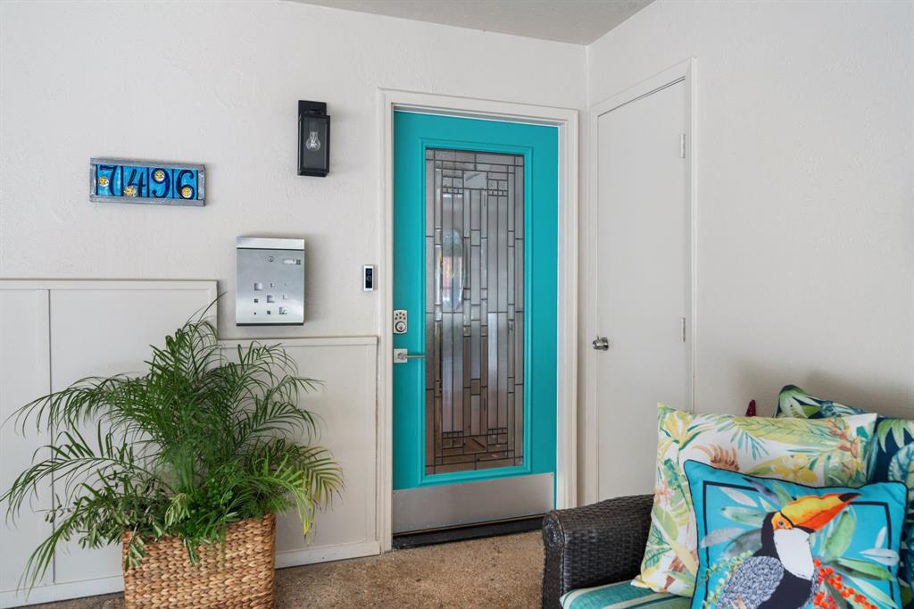 7496 East Northwest Highway, Unit 145 Dallas, TX 75231 - Photo 33 of 35 a living room with furniture and a potted plant