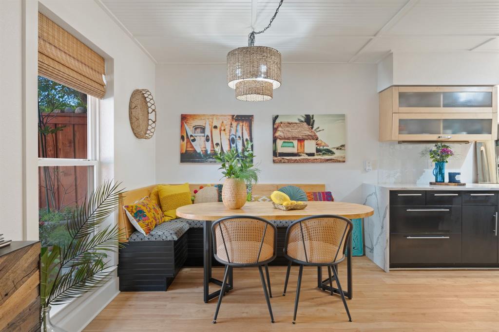 7496 East Northwest Highway, Unit 145 Dallas, TX 75231 - Photo 6 of 35 a dining room with furniture and window