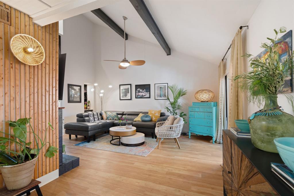 7496 East Northwest Highway, Unit 145 Dallas, TX 75231 - Photo 7 of 35 a living room with furniture and a large window