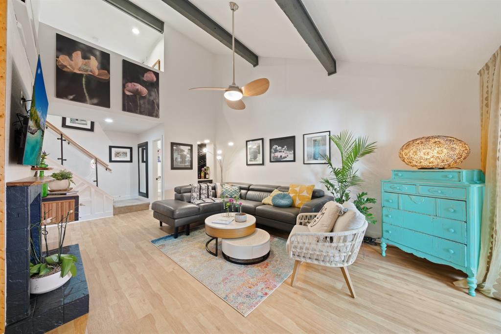 7496 East Northwest Highway, Unit 145 Dallas, TX 75231 - Photo 8 of 35 a living room with furniture and wooden floor