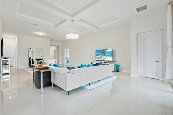 a living room with furniture and a window