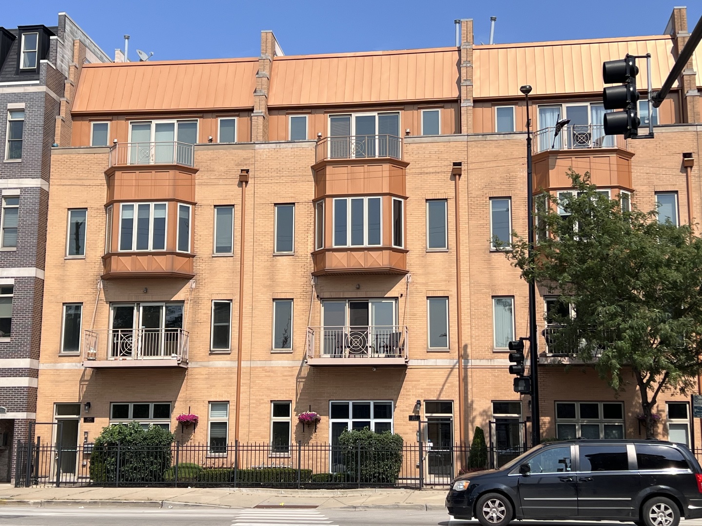 1911 South State Street, Unit 3 Chicago, IL 60616 - Photo 1 of 26 a front view of a residential apartment building with a yard