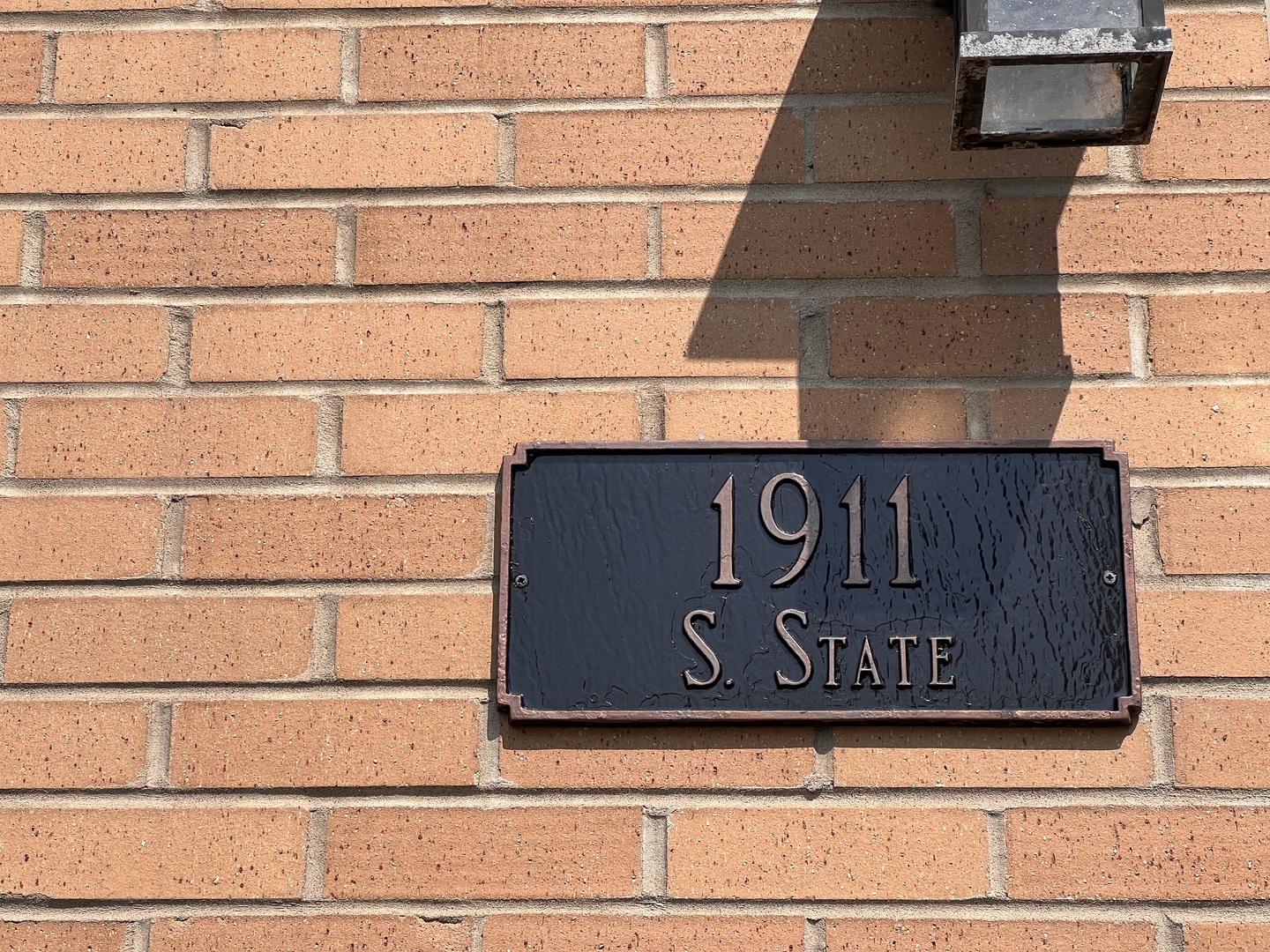 1911 South State Street, Unit 3 Chicago, IL 60616 - Photo 5 of 26 a close up of a street sign